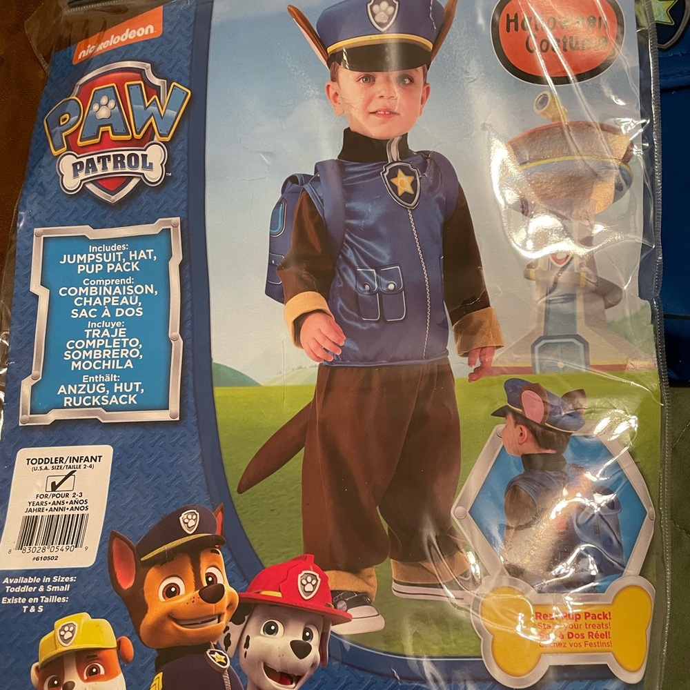 Includes Jumpsuit, hat, and pup pack all in perfect condition.
